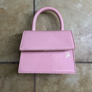Used bubblegum pink mini purse